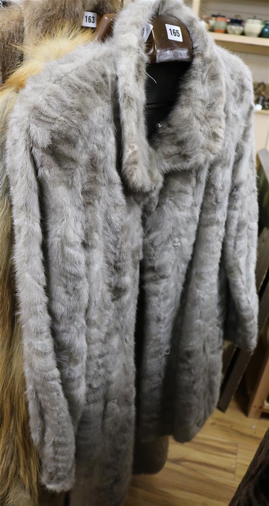 A grey fur coat